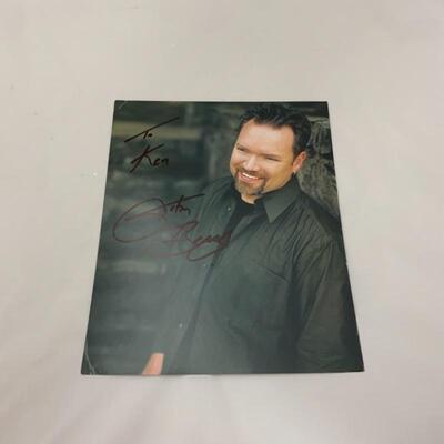 .37. Two John Berry Autographed 8x10s