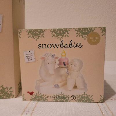 Lot 78: Assorted Department 56 SnowBabies Christmas Figures 
