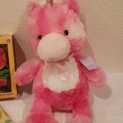 Lot 124: New Wood Puzzle, Play/Dinner Mat and Soft Pink Unicorn 