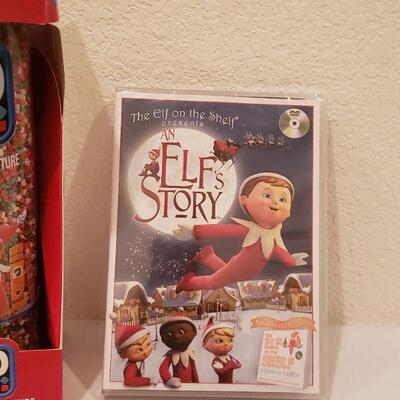 Lot 128: Elf on a Shelf DVD and Game