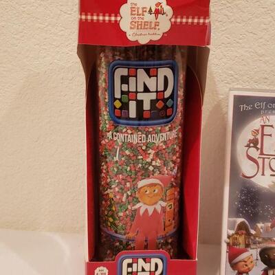 Lot 128: Elf on a Shelf DVD and Game