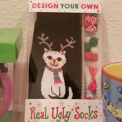 Lot 134: Cat Lovers Gift Lot - Socks, Ornament, Mug, and Cool Cat Ice Mold
