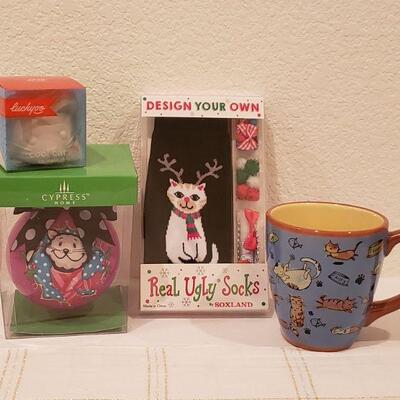 Lot 134: Cat Lovers Gift Lot - Socks, Ornament, Mug, and Cool Cat Ice Mold
