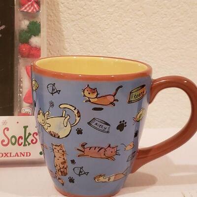 Lot 134: Cat Lovers Gift Lot - Socks, Ornament, Mug, and Cool Cat Ice Mold
