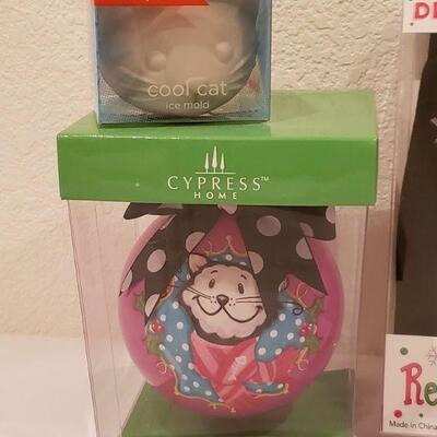 Lot 134: Cat Lovers Gift Lot - Socks, Ornament, Mug, and Cool Cat Ice Mold