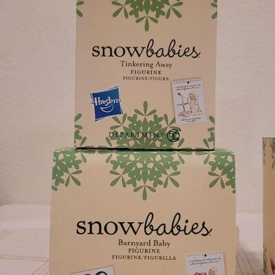 Lot 144: Assorted Dept. 56 SnowBabies Christmas Figures 