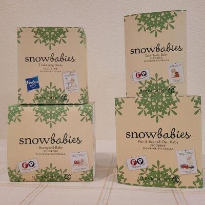 Lot 144: Assorted Dept. 56 SnowBabies Christmas Figures 