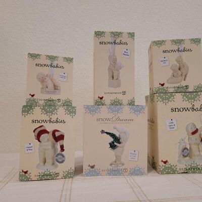 Lot 148: Assorted Dept. 56 SnowBabies Christmas Figures 