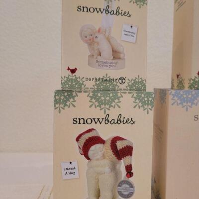 Lot 148: Assorted Dept. 56 SnowBabies Christmas Figures 