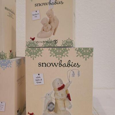 Lot 148: Assorted Dept. 56 SnowBabies Christmas Figures 