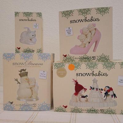 Lot 149: Assorted Dept. 56 SnowBabies Christmas Figures 