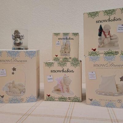 Lot 151: Assorted Dept. 56 SnowBabies Christmas Figures 
