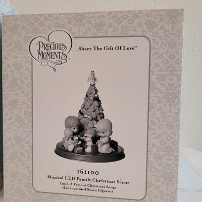 Lot 162: Precious Moments and Dept. 56 SnowBabies Christmas Figures 