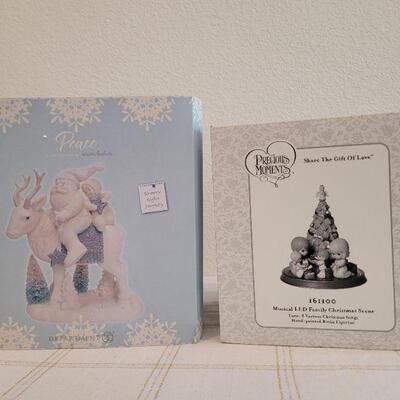Lot 162: Precious Moments and Dept. 56 SnowBabies Christmas Figures 