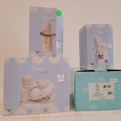 Lot 166: Assorted Dept. 56 SnowBabies Christmas Figures 