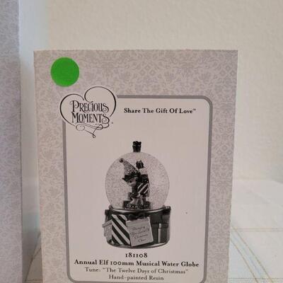 Lot 170: Assorted Precious Moments Christmas NATIVITY Figures and Snowglobe