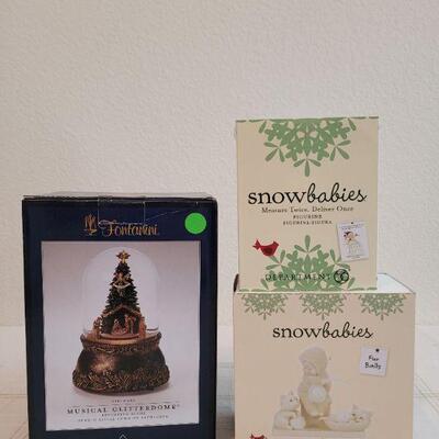 Lot 172: Assorted Dept. 56 SnowBabies Christmas Figures + Musical Glitterdome