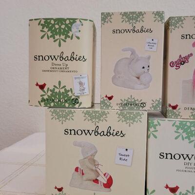 Lot 180: Assorted Dept. 56 SnowBabies Christmas Figures 