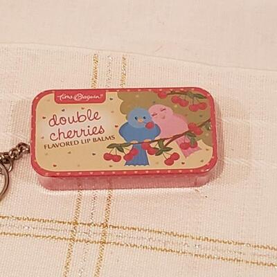Lot 215: Gift Lot Socka, Jewel Ice Tray, Cupcake Ornaments and Lip Balm