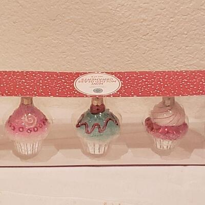 Lot 215: Gift Lot Socka, Jewel Ice Tray, Cupcake Ornaments and Lip Balm