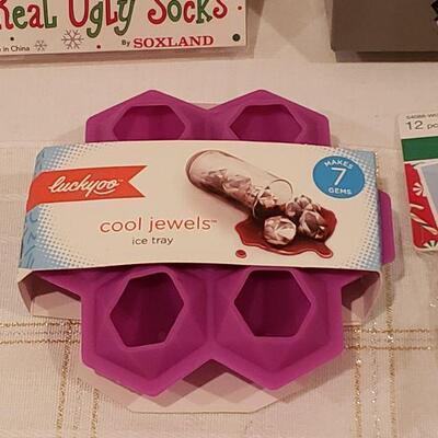 Lot 221: NEW Puzzle, Jewel Ice Tray, Hair Deco, Socks