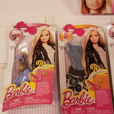 Lot 230: NEW October Barbie and 4 Accessories Packages 