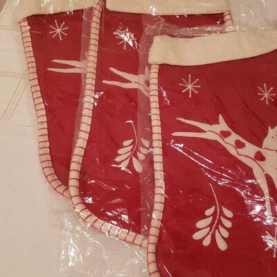 Lot 235: NEW (3) Christmas Stockings, Santa Plushie & JOY Sign