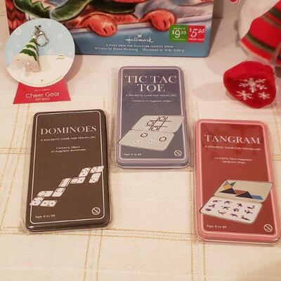 Lot 236: NEW Snowman Plushie, Book & (3) Magnetic Travel Games