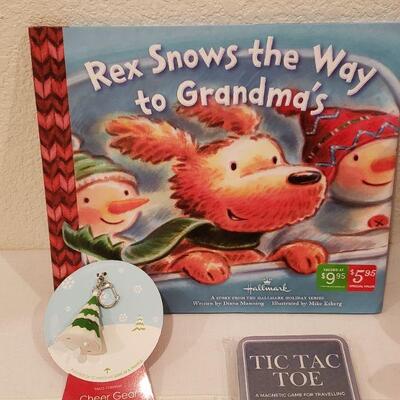 Lot 236: NEW Snowman Plushie, Book & (3) Magnetic Travel Games