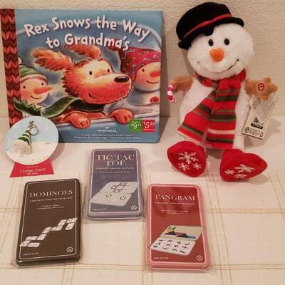 Lot 236: NEW Snowman Plushie, Book & (3) Magnetic Travel Games