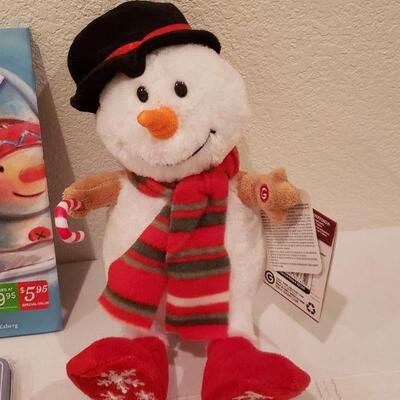 Lot 236: NEW Snowman Plushie, Book & (3) Magnetic Travel Games