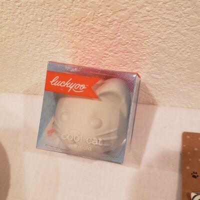 Lot 239: NEW Cat Stocking, Kitchen Towels and Cool Cat Ice Mold