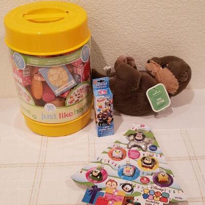Lot 240: NEW Play Food, Bath Coloring Tabs, Ornaments and a Baby Otter Plushie