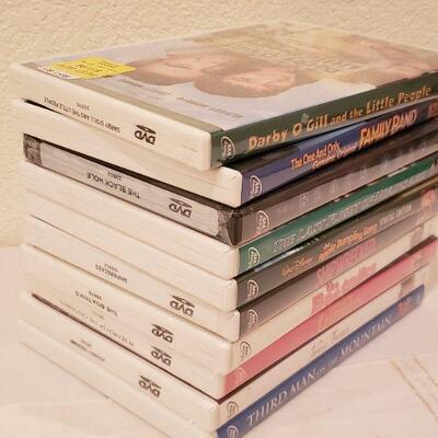 Lot 252: Vintage Disney DVDs (4 Open & the Others are NEW)