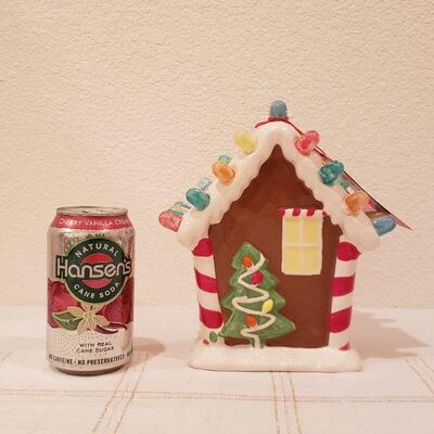 Lot 253: NEW Hallmark Light Up Gingerbread House Deco
