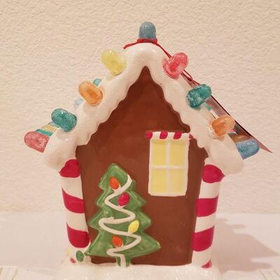 Lot 253: NEW Hallmark Light Up Gingerbread House Deco