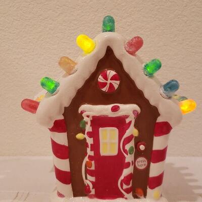 Lot 253: NEW Hallmark Light Up Gingerbread House Deco