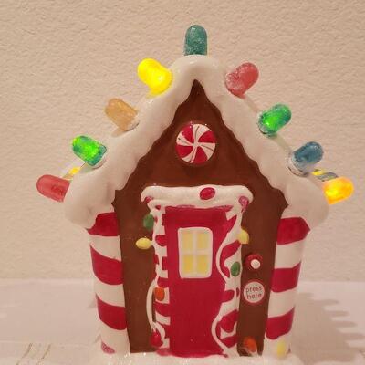 Lot 253: NEW Hallmark Light Up Gingerbread House Deco
