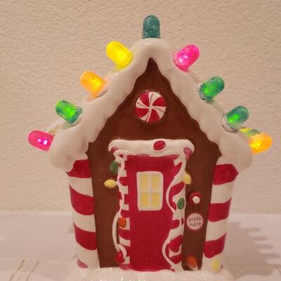 Lot 253: NEW Hallmark Light Up Gingerbread House Deco