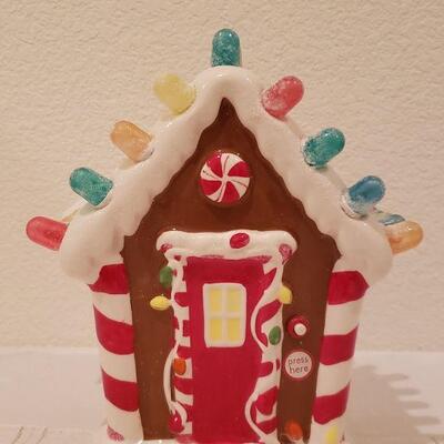 Lot 253: NEW Hallmark Light Up Gingerbread House Deco