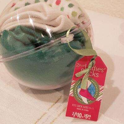 Lot 264: NEW Cheering Snowman, Ornament a,d Socks