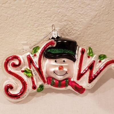 Lot 264: NEW Cheering Snowman, Ornament a,d Socks