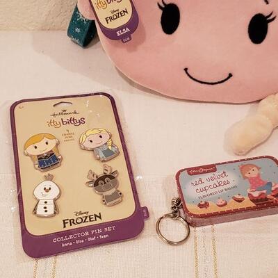 Lot 266: NEW Elsa Wristlet, Itty Bitty Frozen Pins, and Lip Balm