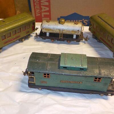 4- pre-war Lionel Trains....