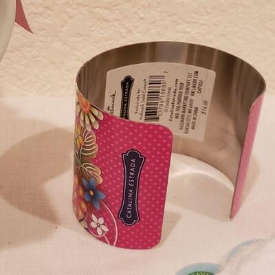 Lot 285: New Coffee Cup, Aloe Socks, Cuff Bracelet & Lip Balm