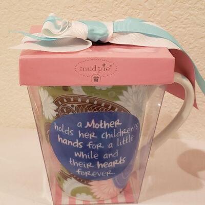 Lot 285: New Coffee Cup, Aloe Socks, Cuff Bracelet & Lip Balm