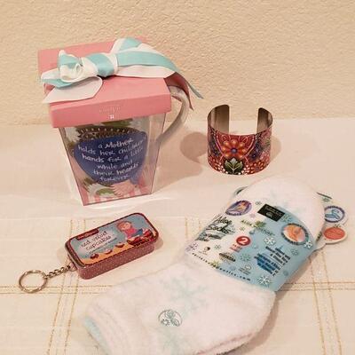 Lot 285: New Coffee Cup, Aloe Socks, Cuff Bracelet & Lip Balm