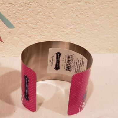 Lot 285: New Coffee Cup, Aloe Socks, Cuff Bracelet & Lip Balm
