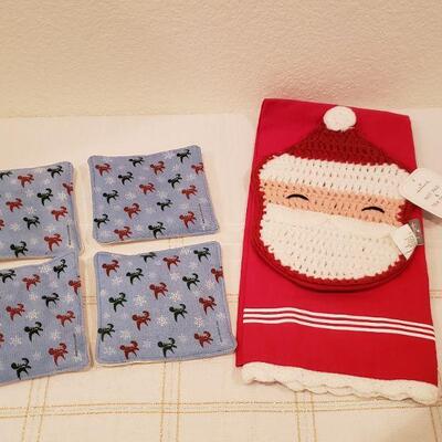 Lot 288: New Santa Tea towel set and Scented Coasters