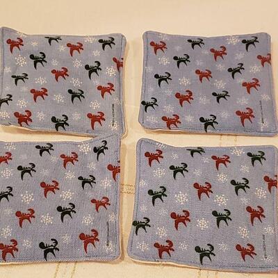 Lot 288: New Santa Tea towel set and Scented Coasters